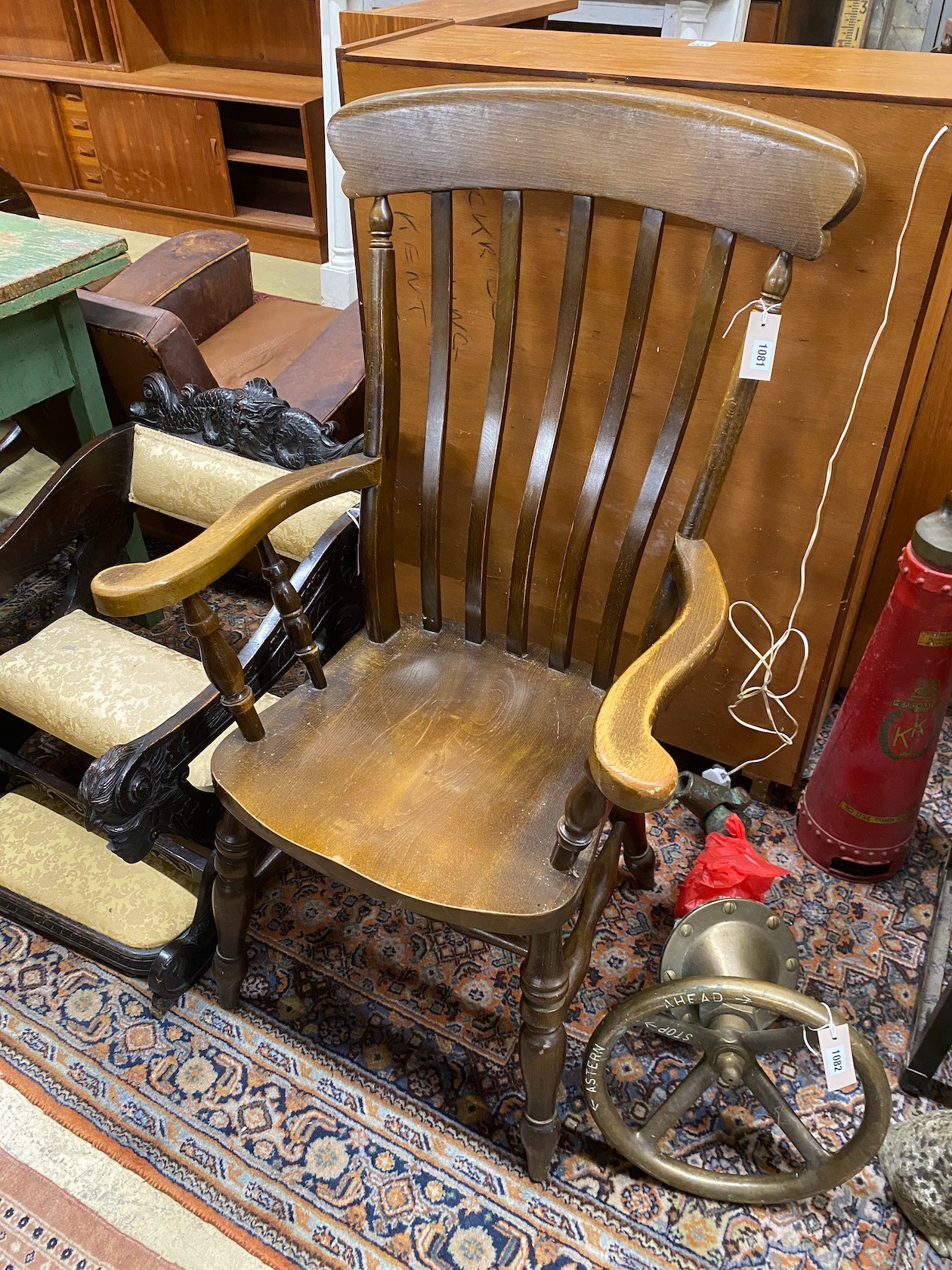 A Victorian style beech lathe back Windsor armchair, width 63cm, height 116cm